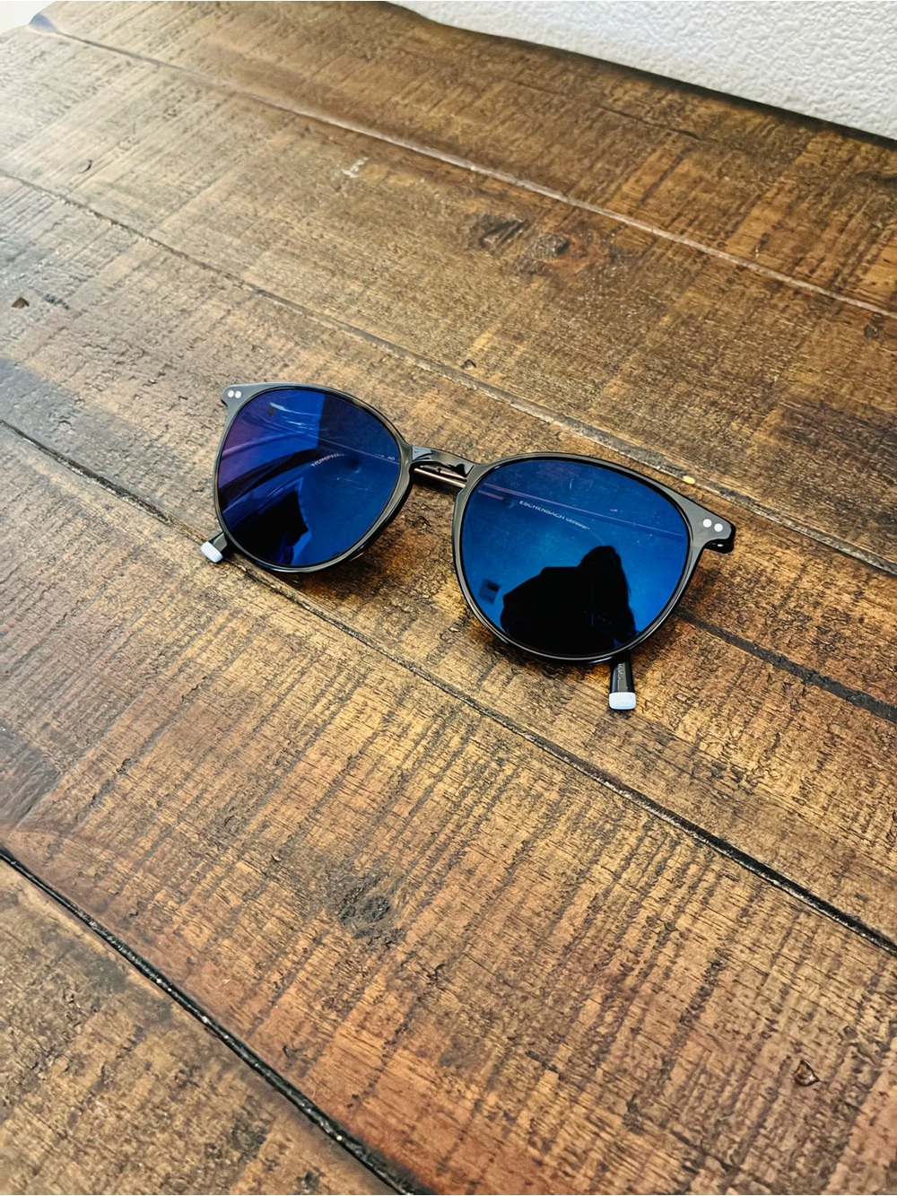 Round Black Frame Sunglasses with Blue Mirrored Lenses